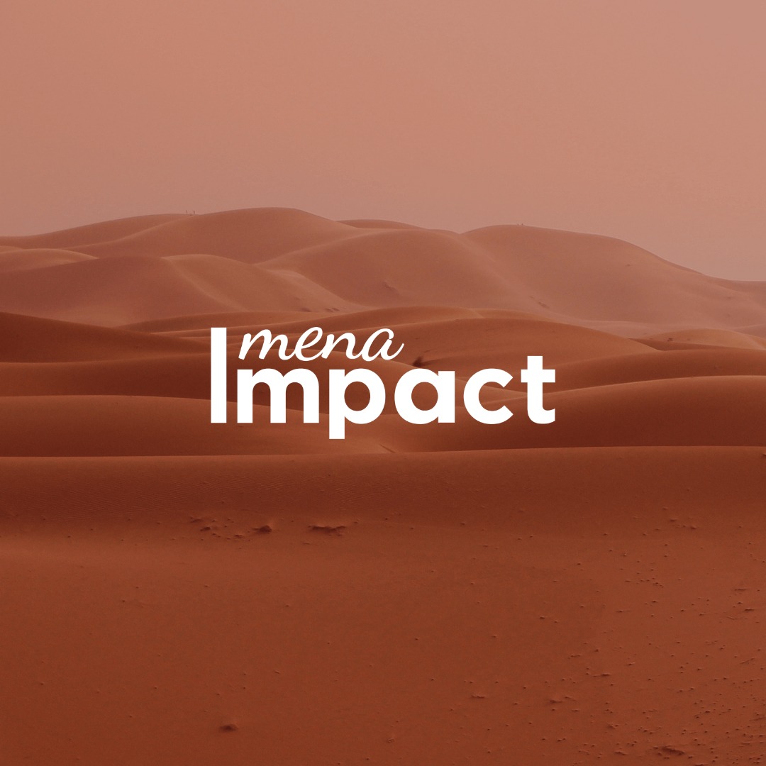 Desert cover with Mena Impact logo